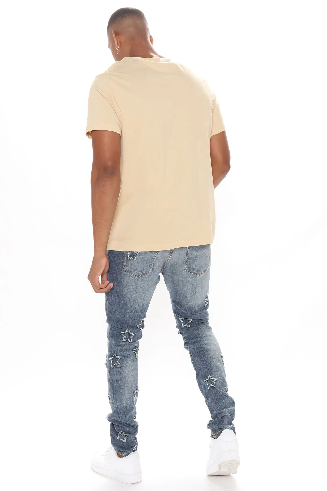 All Over Stars Ripped Stacked Skinny Jeans - Medium Wash