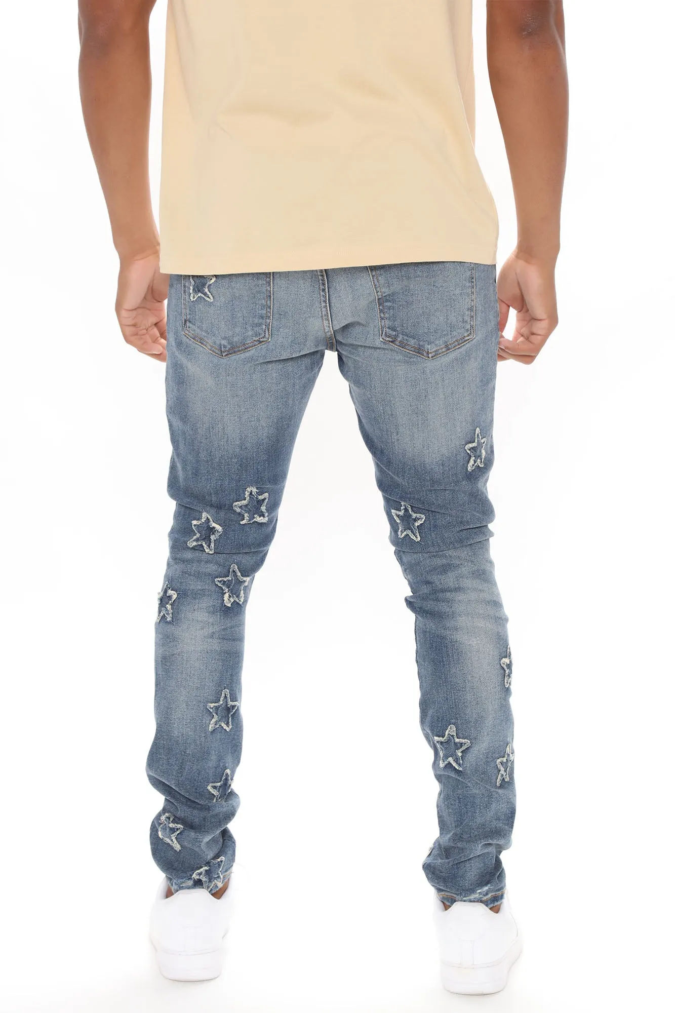 All Over Stars Ripped Stacked Skinny Jeans - Medium Wash