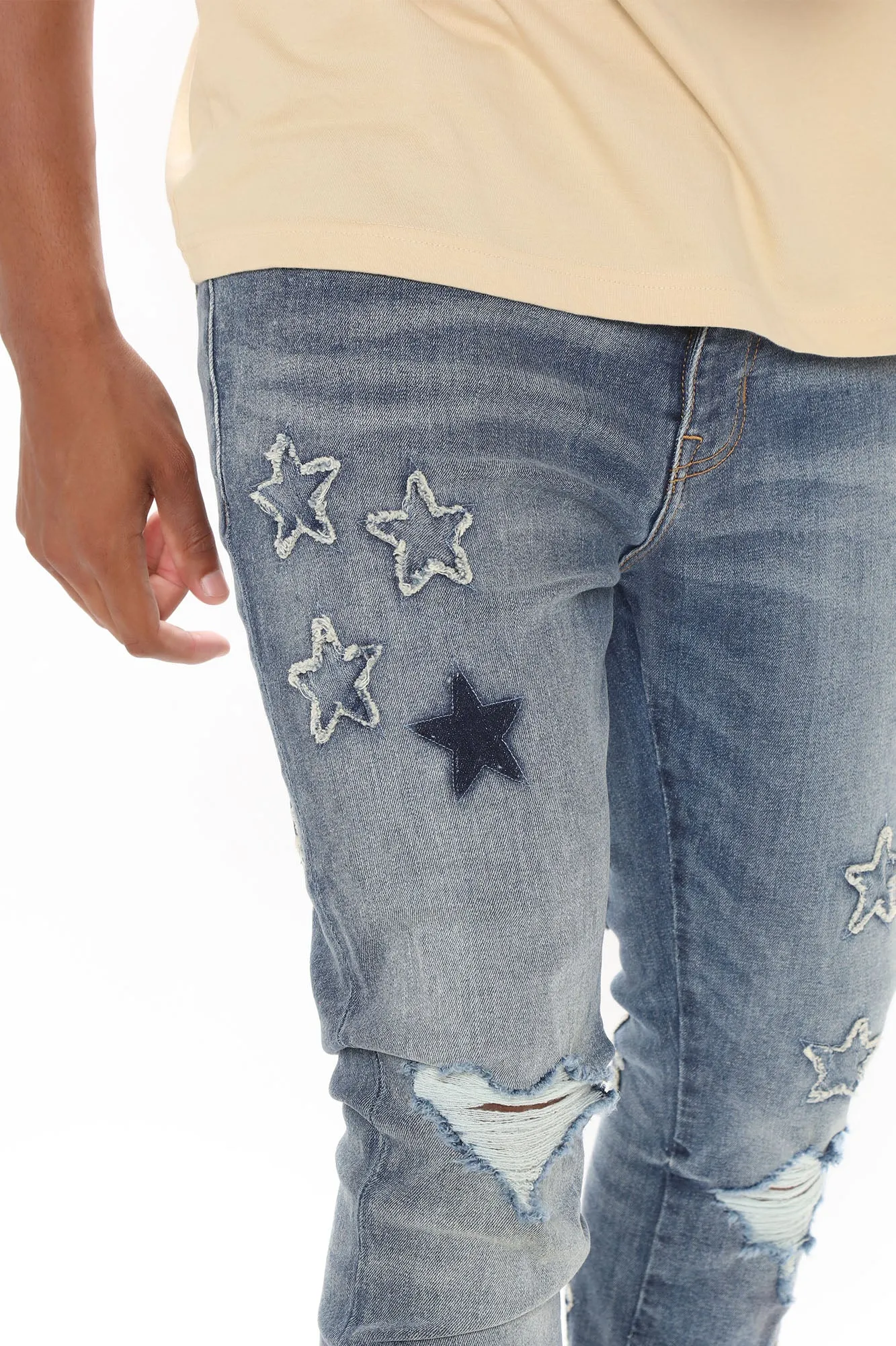 All Over Stars Ripped Stacked Skinny Jeans - Medium Wash