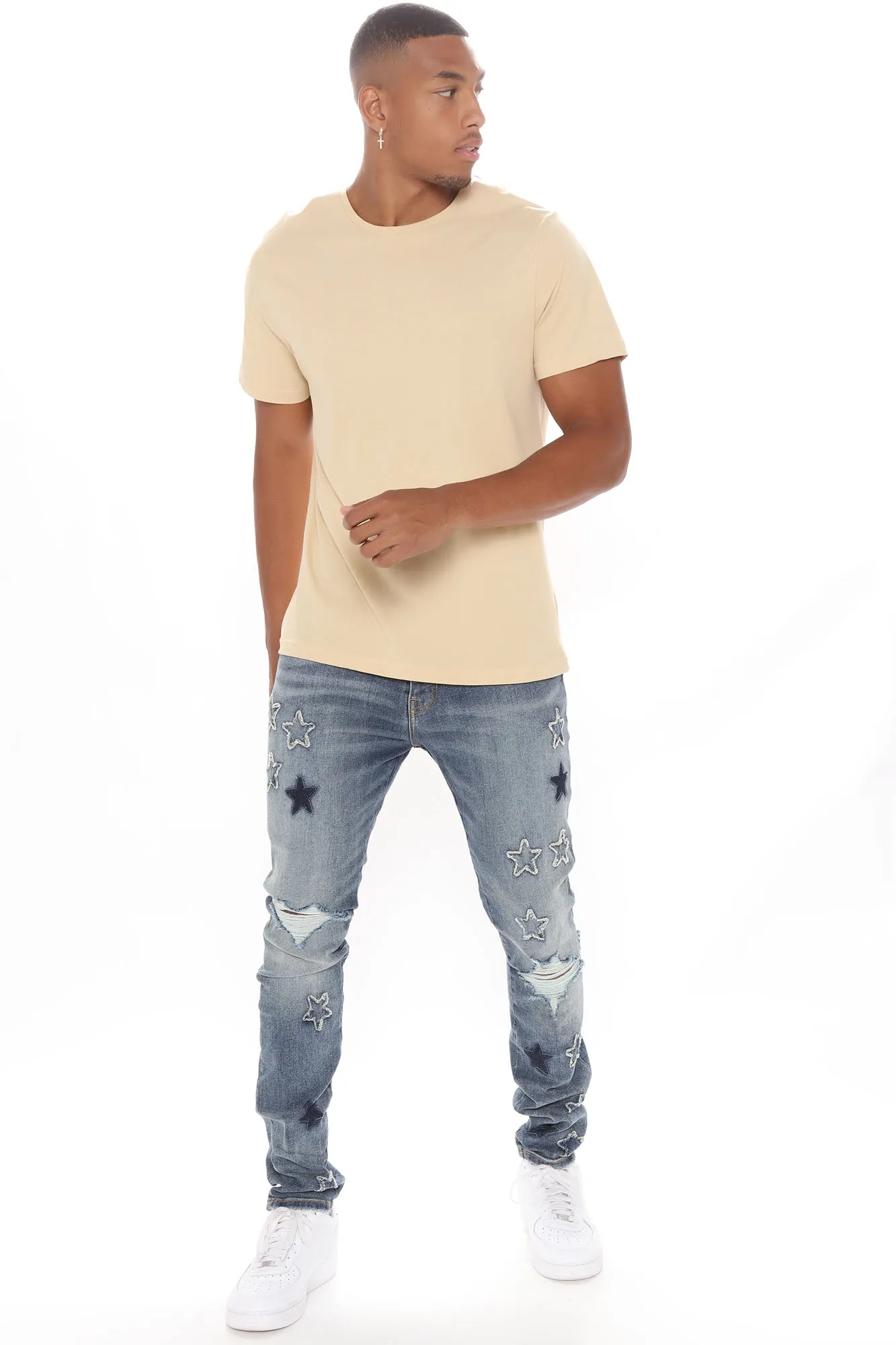 All Over Stars Ripped Stacked Skinny Jeans - Medium Wash
