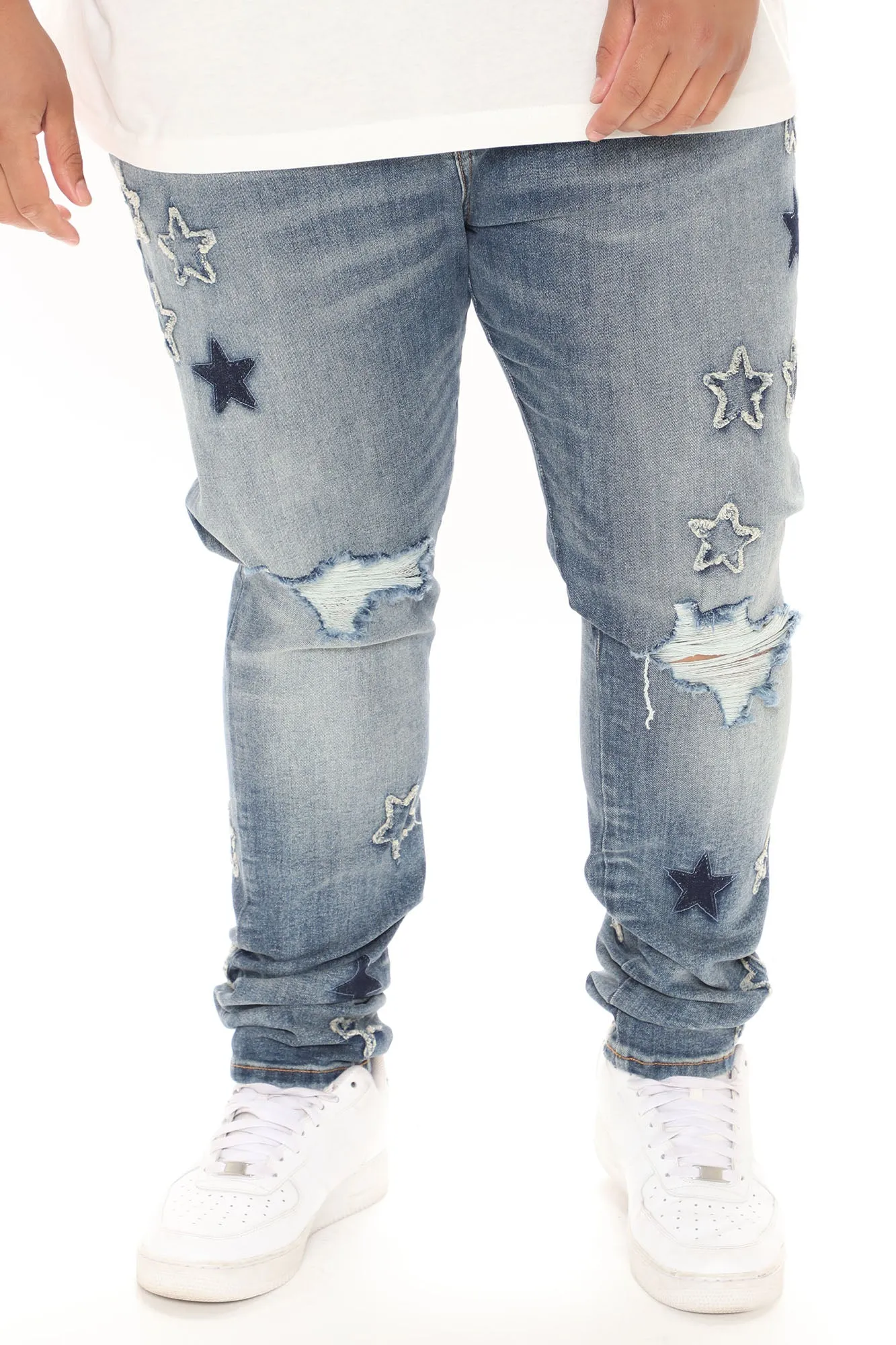 All Over Stars Ripped Stacked Skinny Jeans - Medium Wash